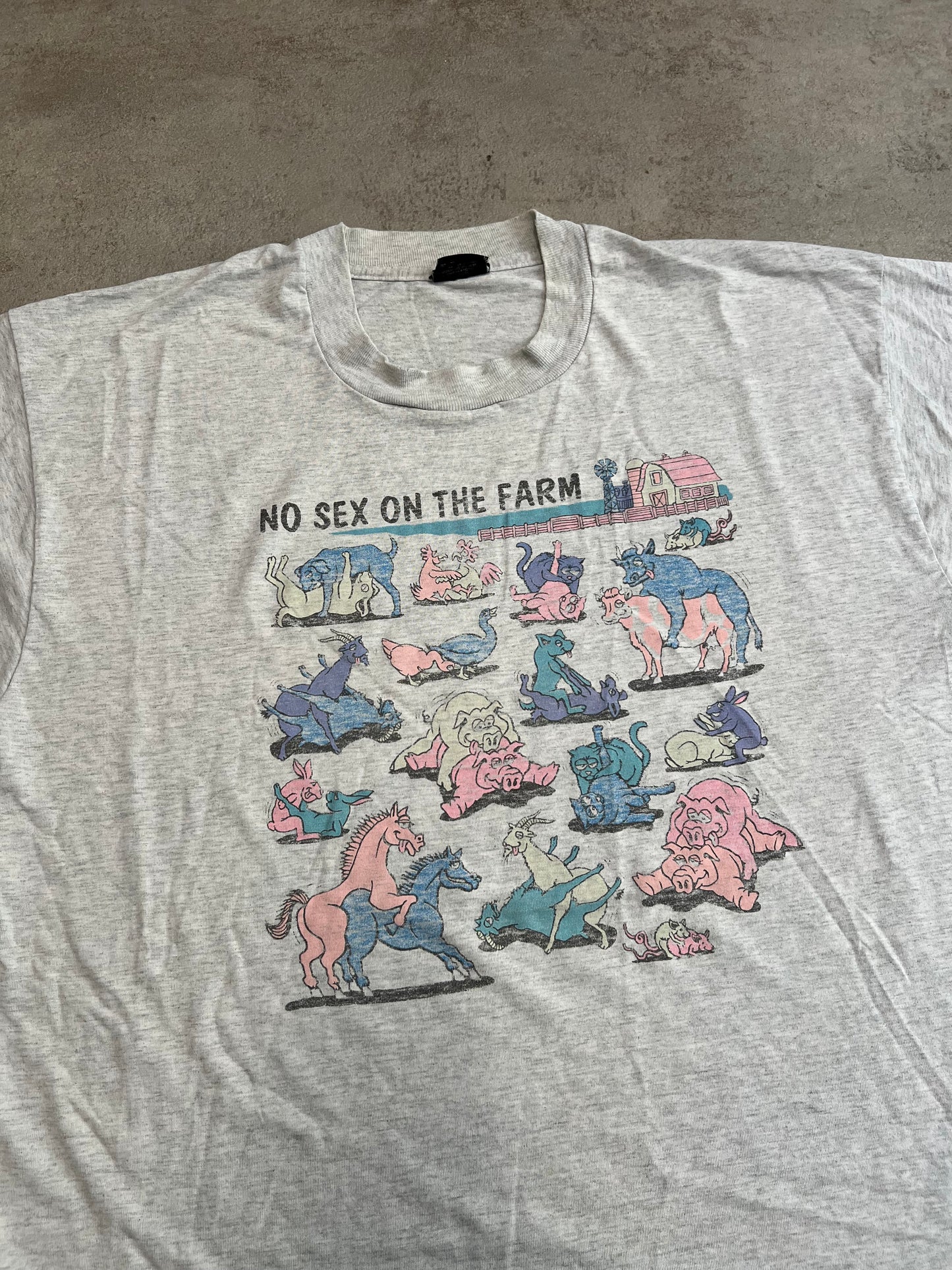 Camiseta Gráfica Vintage Fruit Of The Loom ‘Sex on the farm’ 90’s - L