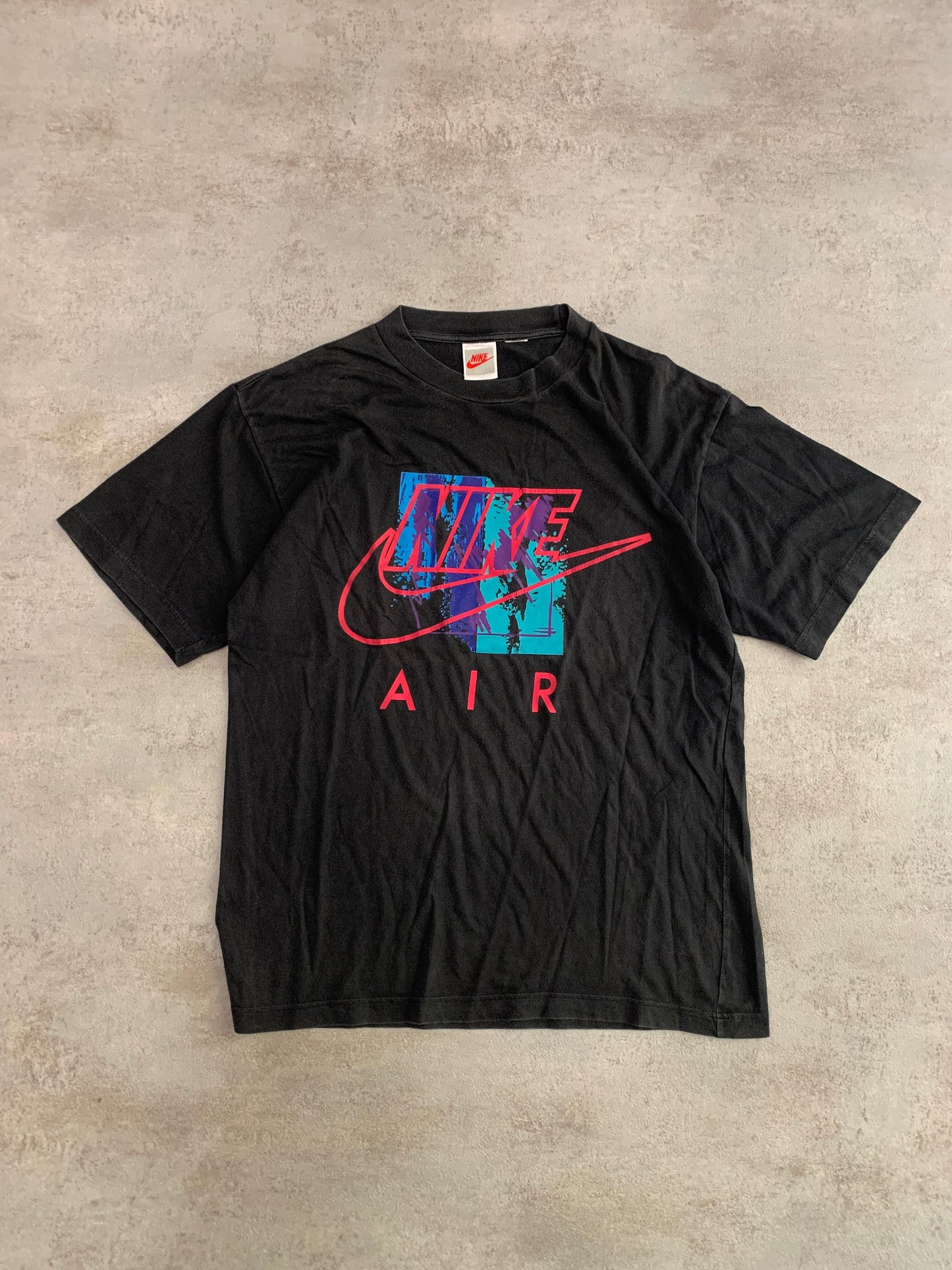 Camiseta Vintage Nike 80’s - L